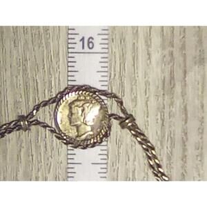 Vintage Coin Charm Bracelet with Twist Design